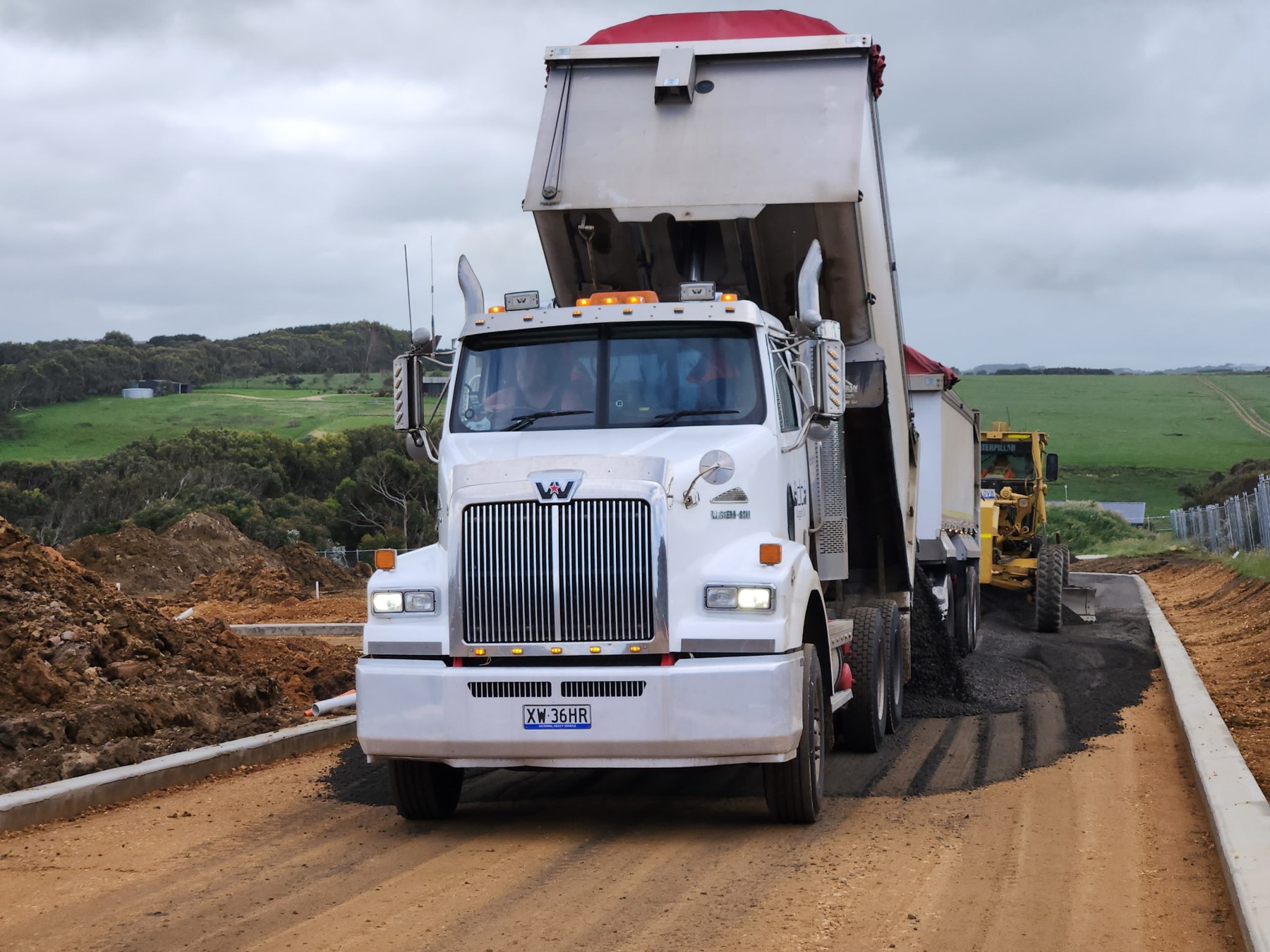Civil Haulage truck delivering material on road construction project